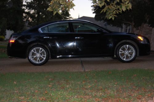 Black with black leather, blue tooth, 27mpg, new tires