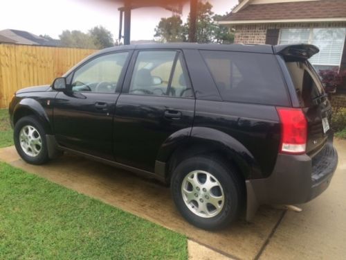 Black, 4-door, excellent condition, loaded