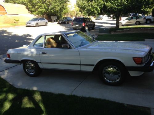 1989 560 sl white well maintained garage kept; low mileage used as a summer car
