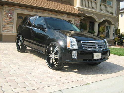 2005 cadillac srx third row ($2koptional 26inch lexani rims) no reserve!!!!