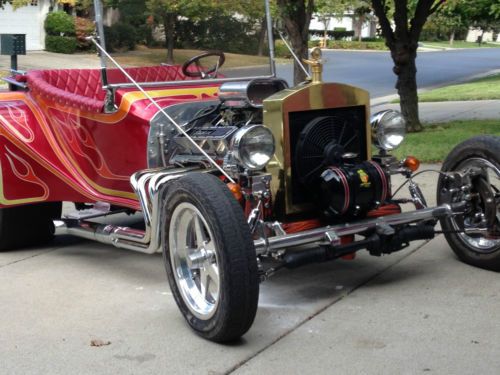 23 t bucket hot rod,small block chevy with a 350 auto trans,headers,huge tires