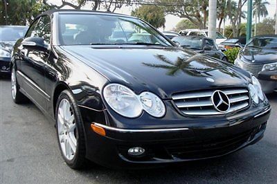 Florida new car trade, super low miles, beautiful black/cappuccion color combo!