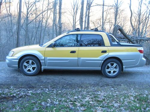 2003 yellow subaru baja