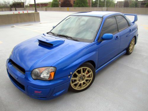 2005 subaru impreza wrx sti sedan 4-door 2.5l turbo 6 speed awd some mods nice