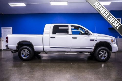 Low miles 5.9l cummins diesel manual mega cab nerf bars bed liner sunroof leathe