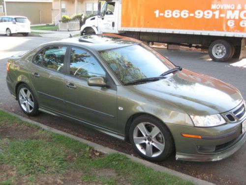 2006 saab 9-3 aero 78k miles; 6-speed manual transmission; dark green; 4-door