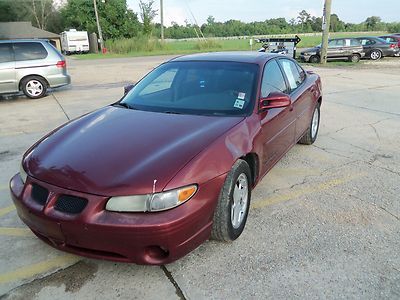 2003 pontiac grand prix, burgundy, very roomy, runs great, cold a/c, no reserve