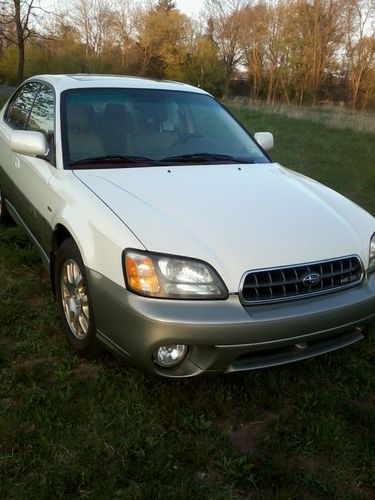 Very clean 03 outback h6 vdc sedan htd leather seats mnrf mcintosh sound !