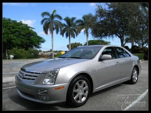 05 sts clean carfax, sunroof, premium sound, burl walnut wood, leather seats fl