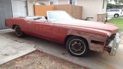 1976 cadillac eldorado convertible for scrap, parts, or restoration.  starts up!